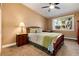 Comfortable bedroom offers a cozy bed, natural light, and a relaxing atmosphere at 675 S Clinton St # 8B, Denver, CO 80247