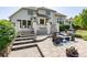 Expansive backyard patio with outdoor seating, elegant landscaping, and inviting ambiance at 4245 S Dawson St, Aurora, CO 80014