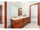Spacious bathroom featuring a double vanity and access to the shower at 4245 S Dawson St, Aurora, CO 80014