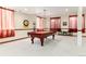 Spacious game room with a pool table, carpet and natural light at 4245 S Dawson St, Aurora, CO 80014