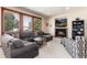 Inviting living room with fireplace and large windows, offering a cozy and bright space at 4245 S Dawson St, Aurora, CO 80014