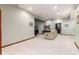 Spacious living area with carpet, neutral walls, recessed lighting and seating at 4245 S Dawson St, Aurora, CO 80014