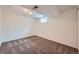 Unfinished basement features a window, neutral walls, and carpeted flooring at 18662 E Brown Pl, Aurora, CO 80013