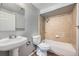 Full bathroom with a vanity sink, toilet and shower over tub at 18662 E Brown Pl, Aurora, CO 80013