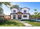 Two-story modern farmhouse with black accents and landscaping at 2751 Zenobia St, Denver, CO 80212