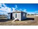 Charming shed with modern design, offering versatile storage and workspace solutions at 34241 E Columbine Trl, Elizabeth, CO 80107