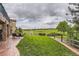 Backyard featuring a well-manicured lawn and landscaping at 7758 Edgewater Ct, Lone Tree, CO 80124
