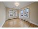 Cozy bedroom features hardwood floors, natural light, and a serene atmosphere at 371 Birch St, Denver, CO 80220