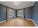 Stylish bedroom with hardwood floors, natural light, and calming, neutral-toned walls at 371 Birch St, Denver, CO 80220