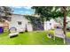 Serene backyard with artificial grass, seating, and climbing ivy at 1266 N Pearl St, Denver, CO 80203