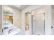 Spacious bathroom featuring double sinks, a toilet, and a glass door shower at 1266 N Pearl St, Denver, CO 80203
