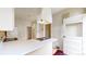 Open concept kitchen with double sink, durable countertops, and convenient layout at 1266 N Pearl St, Denver, CO 80203