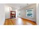 Bright living room with hardwood floors and a fireplace, offering a cozy and elegant space for relaxation at 1266 N Pearl St, Denver, CO 80203