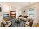 Stylishly furnished living room featuring hardwood floors, a fireplace, and tasteful decor, creating a welcoming atmosphere at 1266 N Pearl St, Denver, CO 80203