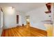 Spacious living room with gleaming hardwood floors, offering a versatile space for customization and comfortable living at 1266 N Pearl St, Denver, CO 80203