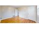 Bedroom showcasing hardwood floors and an open doorway at 415 S Parfet St, Lakewood, CO 80226