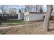 View of backyard sheds and ample room for outdoor activities at 415 S Parfet St, Lakewood, CO 80226