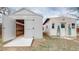Outdoor sheds with ramps, doors, and windows provide extra storage space at 415 S Parfet St, Lakewood, CO 80226
