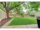 Expansive backyard featuring a playset and shed, perfect for outdoor enjoyment at 10527 Pierson Cir, Westminster, CO 80021