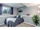Serene bedroom with neutral tones, a comfortable bed, and a view from the window at 10527 Pierson Cir, Westminster, CO 80021