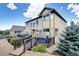 Beautiful backyard with a bridge, deck, and nice landscaping at 11951 Singing Winds St, Parker, CO 80138