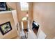 Spacious entryway featuring stairs, chandelier, wooden door and views of other rooms at 11951 Singing Winds St, Parker, CO 80138