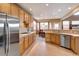 Bright and modern kitchen with a stainless steel refrigerator, and sleek appliances at 11951 Singing Winds St, Parker, CO 80138