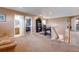 Open space featuring office, stairs, and views of adjacent rooms at 11951 Singing Winds St, Parker, CO 80138