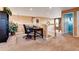 Office area featuring desk, carpet flooring, and neutral walls with plants at 11951 Singing Winds St, Parker, CO 80138