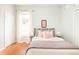 Charming bedroom with hardwood floors, a full-sized bed, and a large window at 250 S Ogden St, Denver, CO 80209