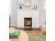 Elegant fireplace with mantel and decorative items, adding a touch of sophistication to the room at 250 S Ogden St, Denver, CO 80209
