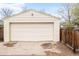 Exterior of garage with a two-car garage door and a simple, clean design at 250 S Ogden St, Denver, CO 80209