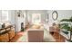 Bright and open living area with fireplace, hardwood floors, and stylish furnishings at 250 S Ogden St, Denver, CO 80209