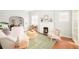 Bright living room with an open layout, fireplace, and stylish furnishings for a welcoming feel at 250 S Ogden St, Denver, CO 80209