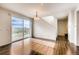 Bright dining room with hardwood floors and sliding glass doors at 11099 Pastel Pt, Parker, CO 80134