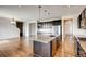 Modern kitchen with granite countertops and dark cabinetry at 11099 Pastel Pt, Parker, CO 80134