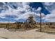 Community playground with modern equipment and benches at 11099 Pastel Pt, Parker, CO 80134