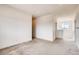 Empty upstairs hallway with carpeted floor and window at 11099 Pastel Pt, Parker, CO 80134