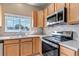 Bright kitchen featuring stainless appliances and natural light at 9387 Ashbury Cir # 203, Parker, CO 80134