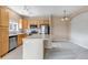 Bright kitchen with stainless steel appliances and eat in dining area at 9387 Ashbury Cir # 203, Parker, CO 80134