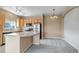 Bright kitchen with stainless steel appliances and eat in dining area at 9387 Ashbury Cir # 203, Parker, CO 80134