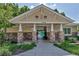 Pool gate and entrance with a covered area and stonework, offering convenience and style at 9387 Ashbury Cir # 203, Parker, CO 80134