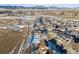 Aerial view of a vacant lot in a residential area showcasing the community, mountain views, and open space views at 945 Saint Andrews Ln, Louisville, CO 80027