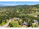 Breathtaking aerial view of the neighborhood nestled in the mountains at 1555 Genesee Ridge Rd, Golden, CO 80401