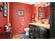 Bathroom with a modern vanity, colorful wall and stylish decor at 1555 Genesee Ridge Rd, Golden, CO 80401