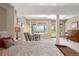Spacious bedroom with mountain views and comfortable seating area at 1555 Genesee Ridge Rd, Golden, CO 80401