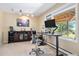 Bright home office space with large window and modern furniture at 1555 Genesee Ridge Rd, Golden, CO 80401
