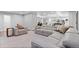 Expansive living room featuring comfortable seating, stylish decor, and an open layout at 9939 E Aberdeen Ave, Englewood, CO 80111