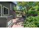 Spacious backyard patio with a covered area offering serene outdoor enjoyment at 14150 Foothill Ln, Golden, CO 80401
