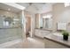 Bright bathroom features a glass shower, double sink vanity, and neutral tones at 14150 Foothill Ln, Golden, CO 80401